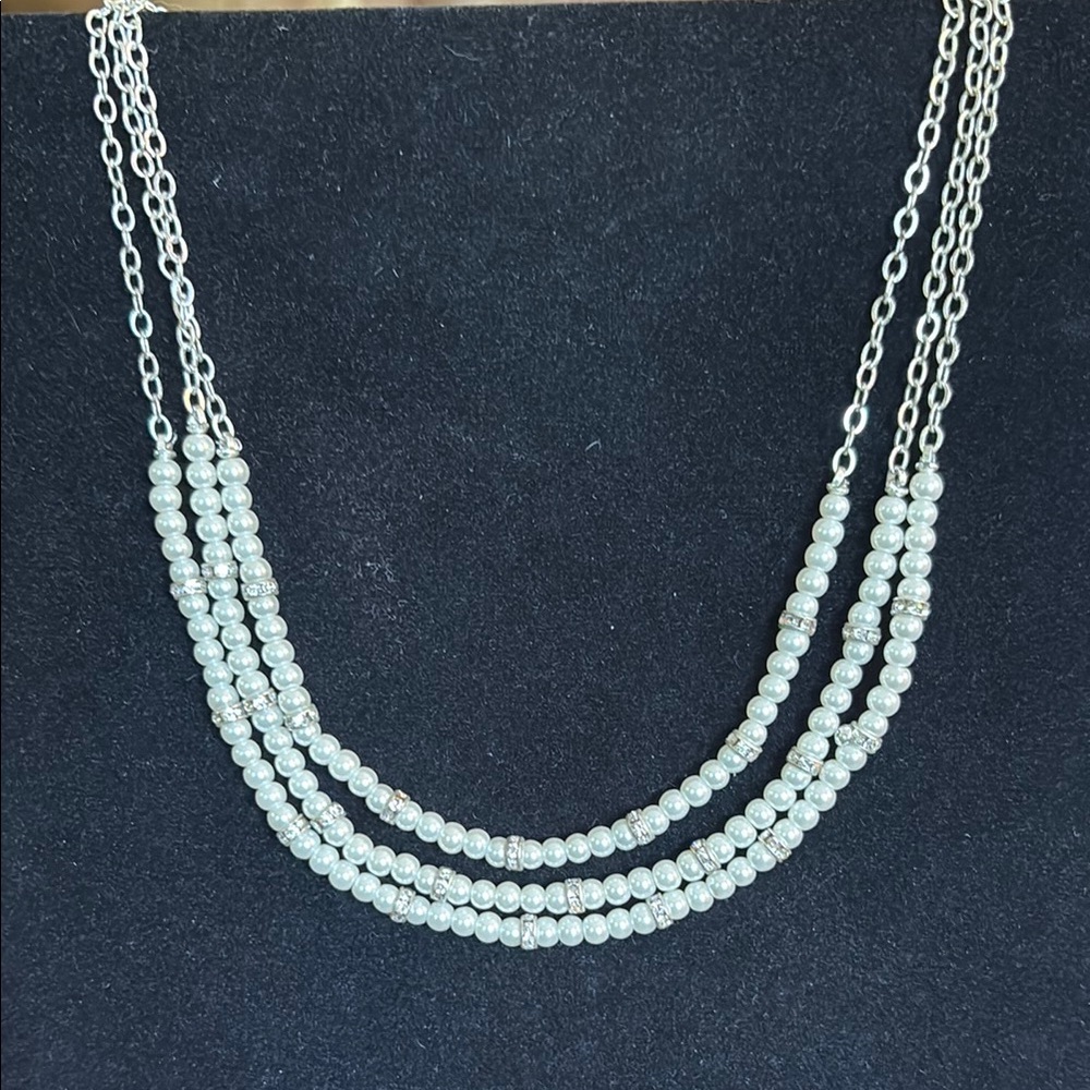 Silver and Pearl Multi-Strand Necklace with Shimmering Beads